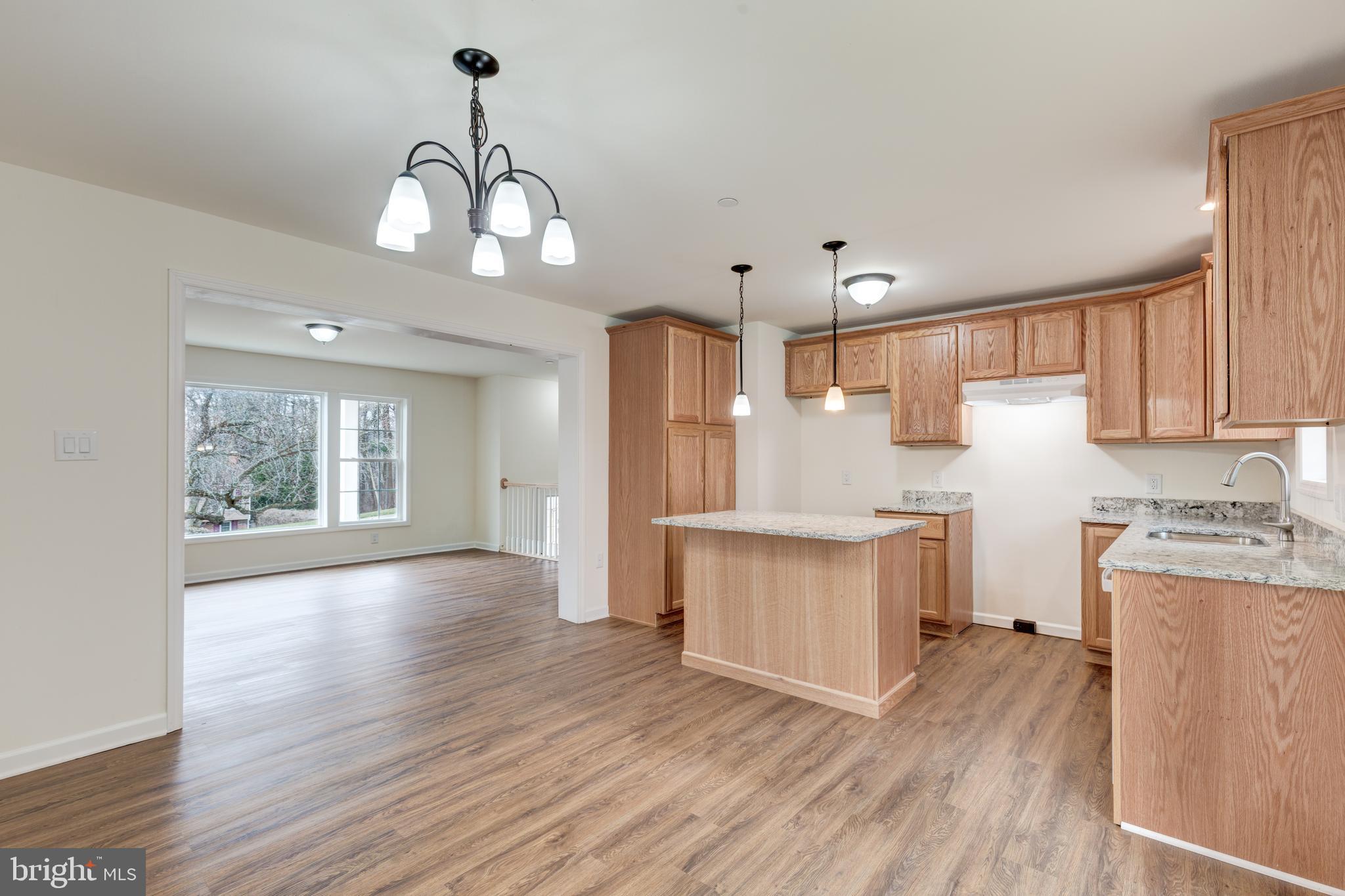 3406 Viewridge Circle Manchester, MD 21102 - Photo 11 of 57 a kitchen with stove and wooden floor