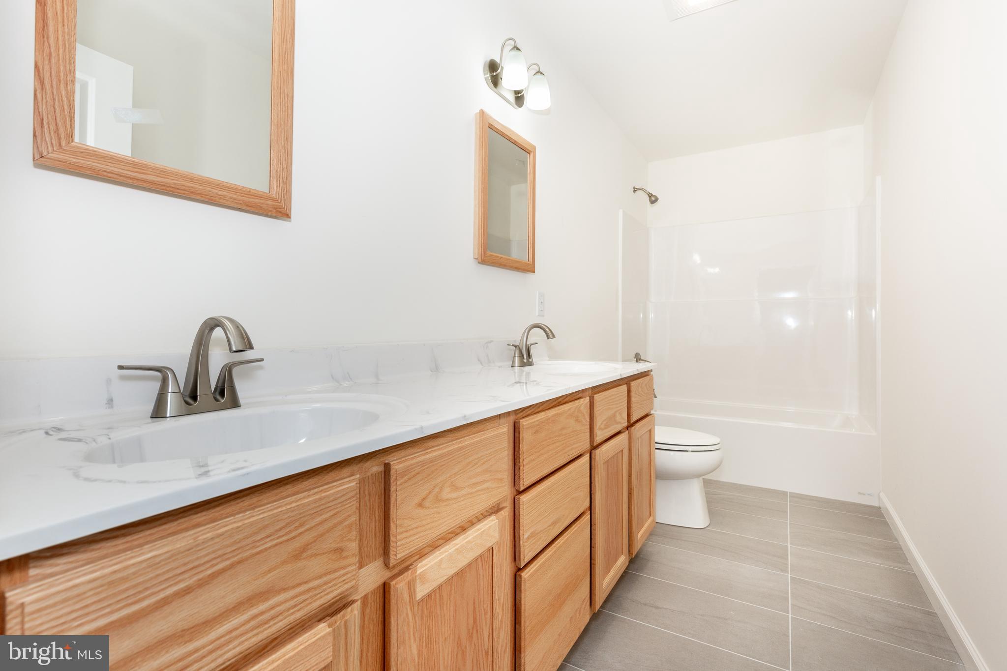 3406 Viewridge Circle Manchester, MD 21102 - Photo 14 of 57 a bathroom with a sink and a toilet