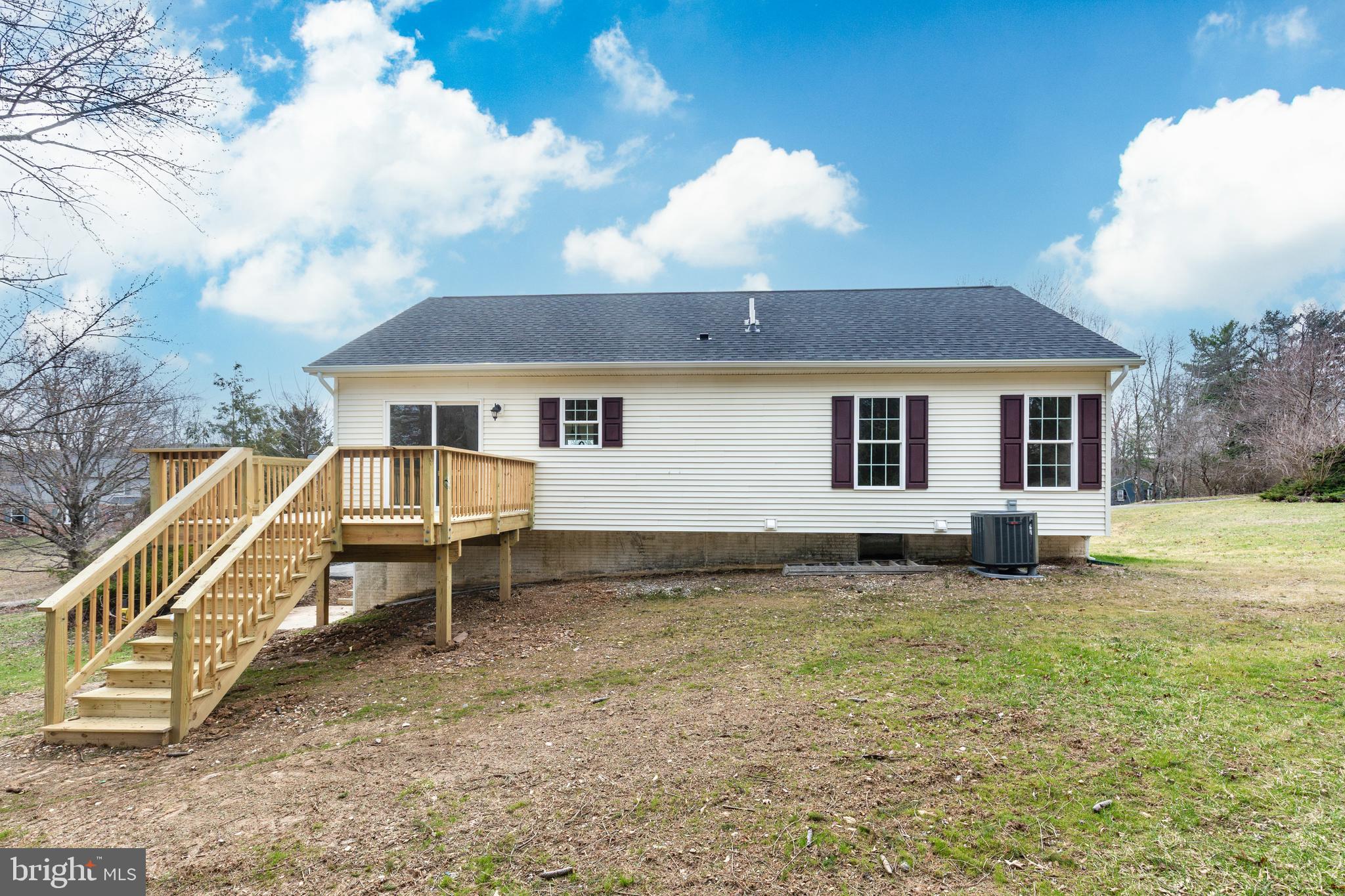 3406 Viewridge Circle Manchester, MD 21102 - Photo 19 of 57 a view of a house with a chairs in a patio