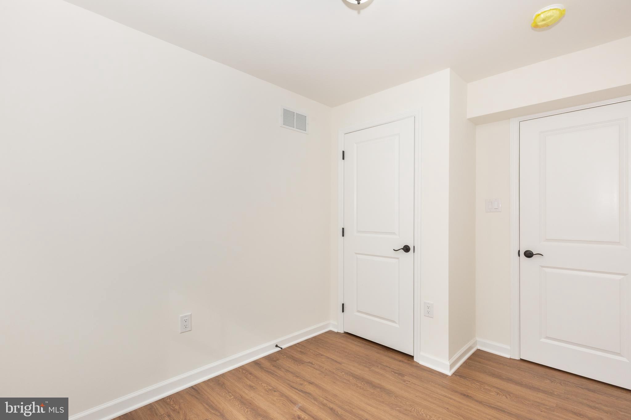 3406 Viewridge Circle Manchester, MD 21102 - Photo 39 of 57 a view of an empty room with wooden floor
