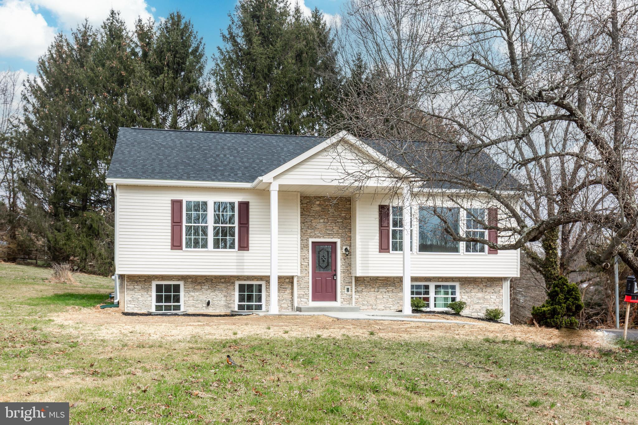 3406 Viewridge Circle Manchester, MD 21102 - Photo 46 of 57 front view of a house with a yard