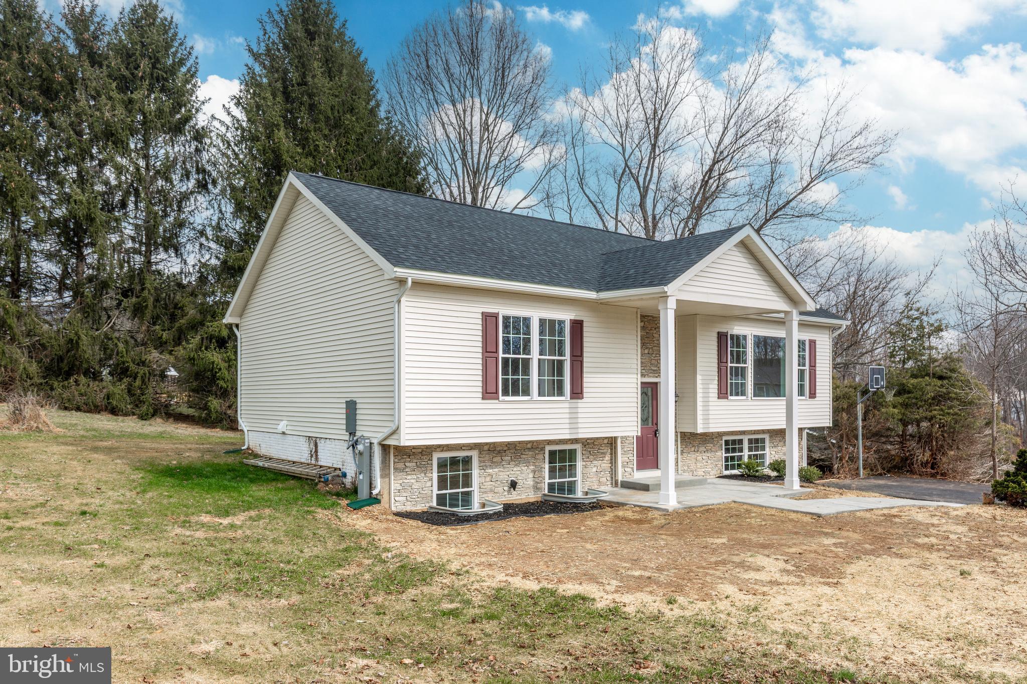 3406 Viewridge Circle Manchester, MD 21102 - Photo 53 of 57 a view of a house with a yard covered in snow