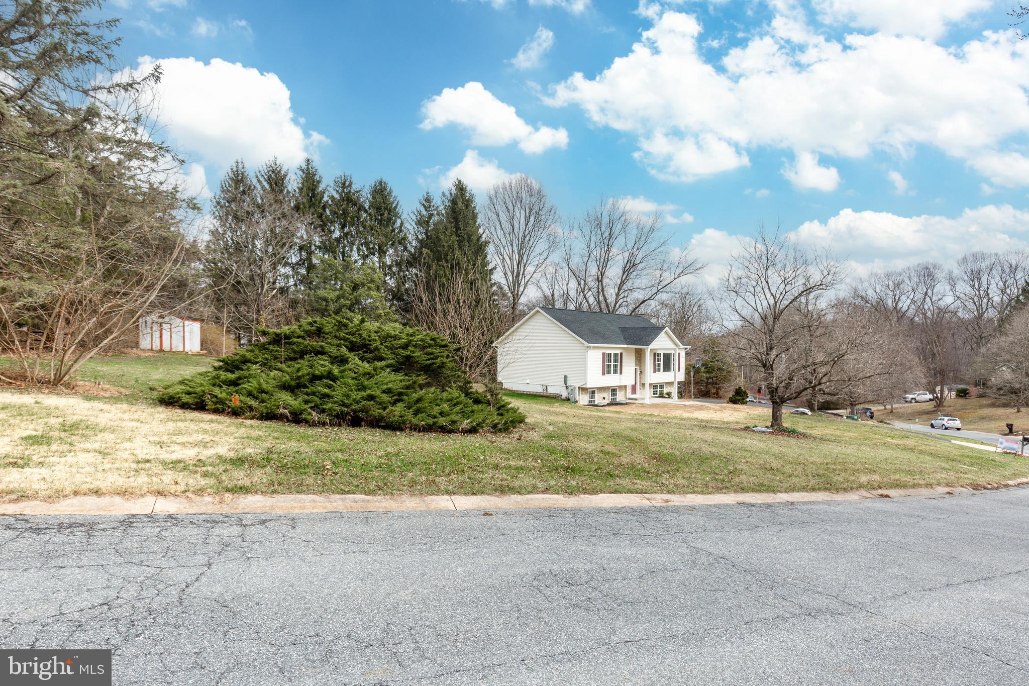 3406 Viewridge Circle Manchester, MD 21102 - Photo 54 of 57 a front view of a house with a yard and garage