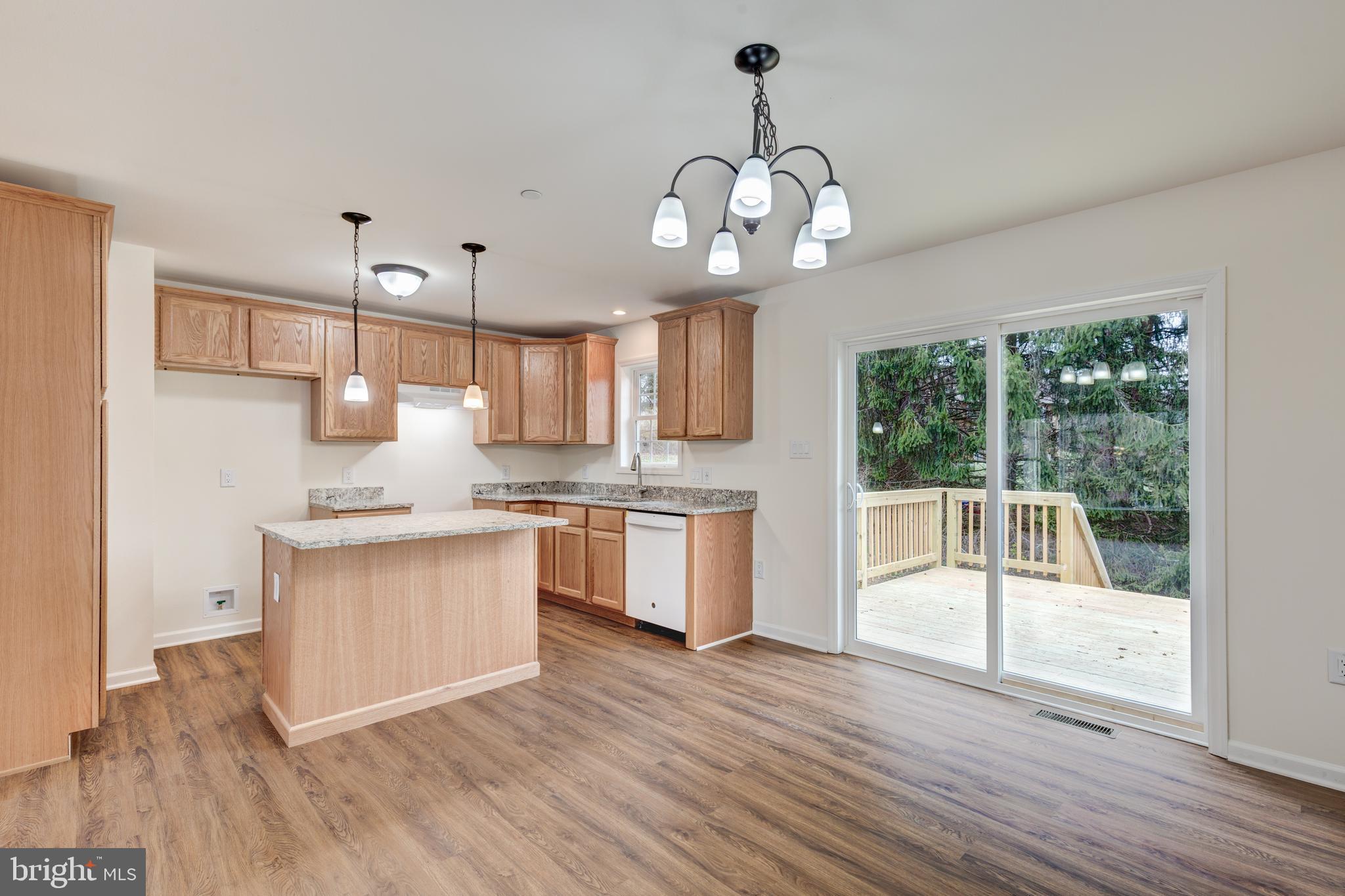 3406 Viewridge Circle Manchester, MD 21102 - Photo 10 of 57 a kitchen with stainless steel appliances granite countertop a stove and cabinets