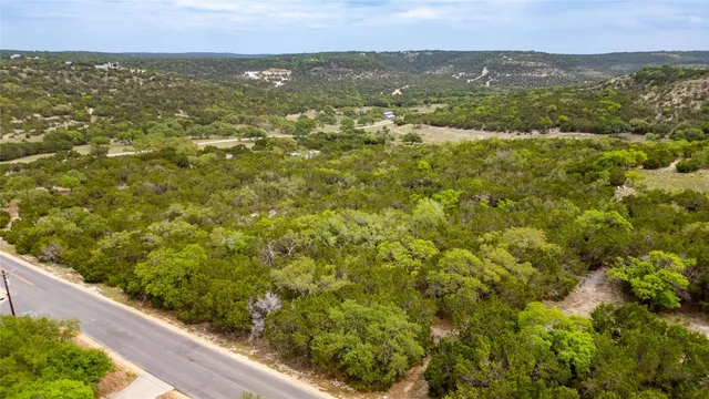 a view of a city with mountains in the background