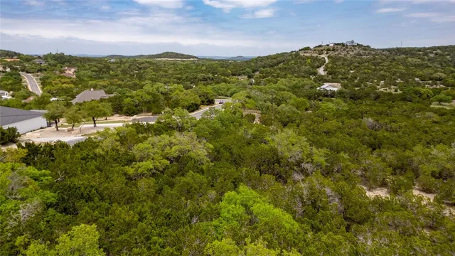 a view of a city with mountains in the background
