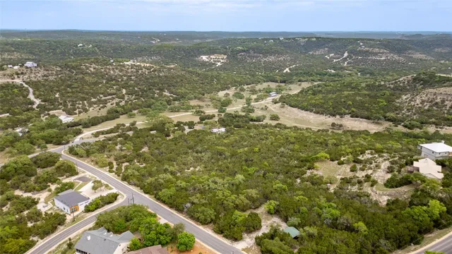 a view of city with ocean
