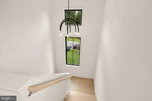 a view of entryway with wooden floor