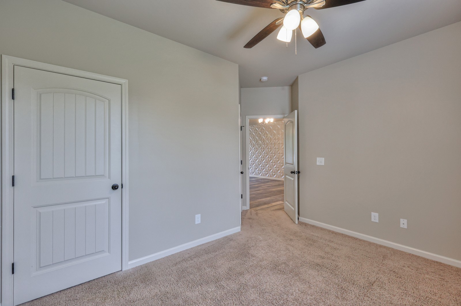 911 Brigade Loop Murfreesboro, TN 37128 - Photo 15 of 29 wooden floor in an empty room with a chandelier fan