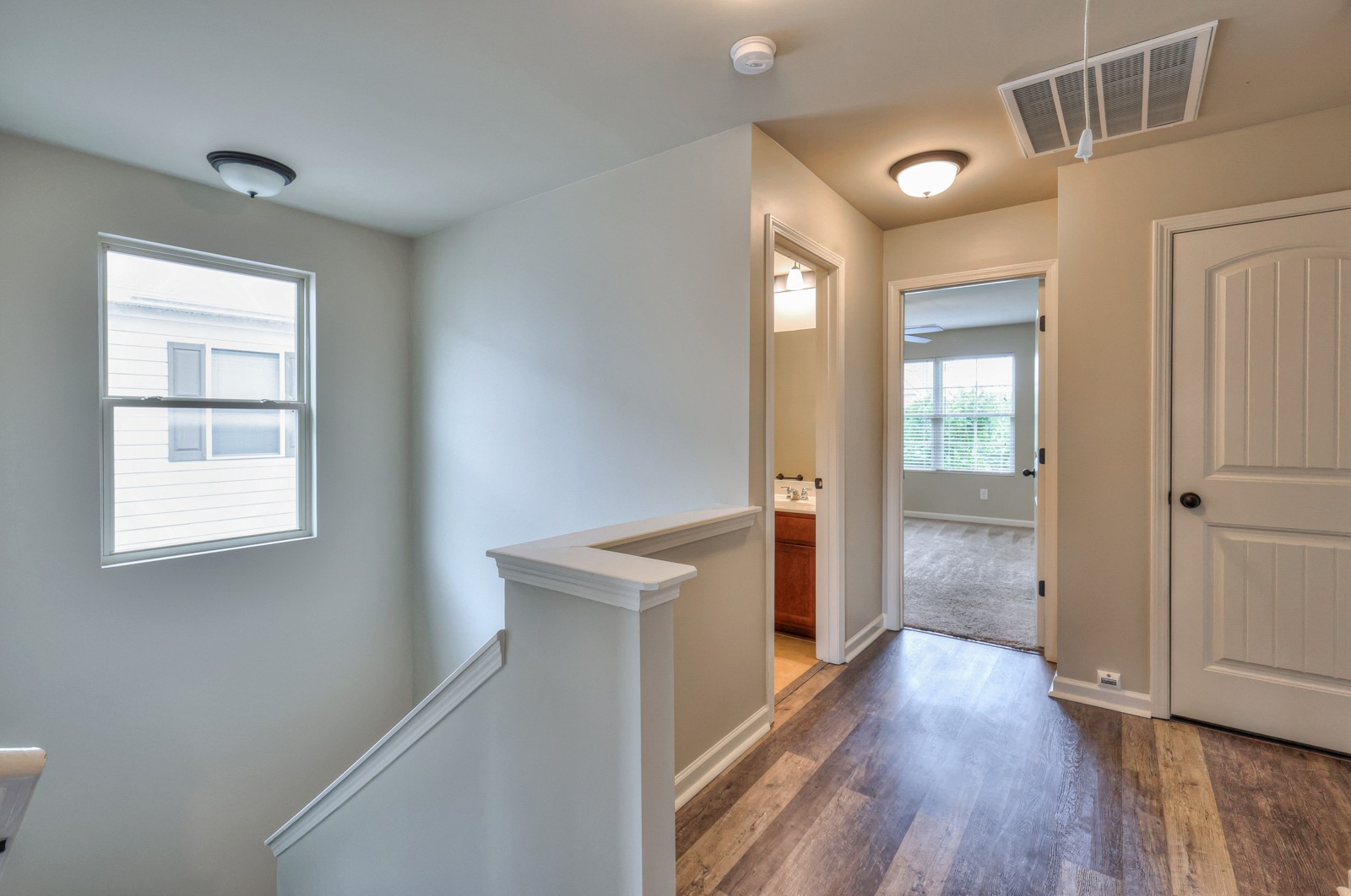911 Brigade Loop Murfreesboro, TN 37128 - Photo 20 of 29 a view of a hallway with wooden floor and closet
