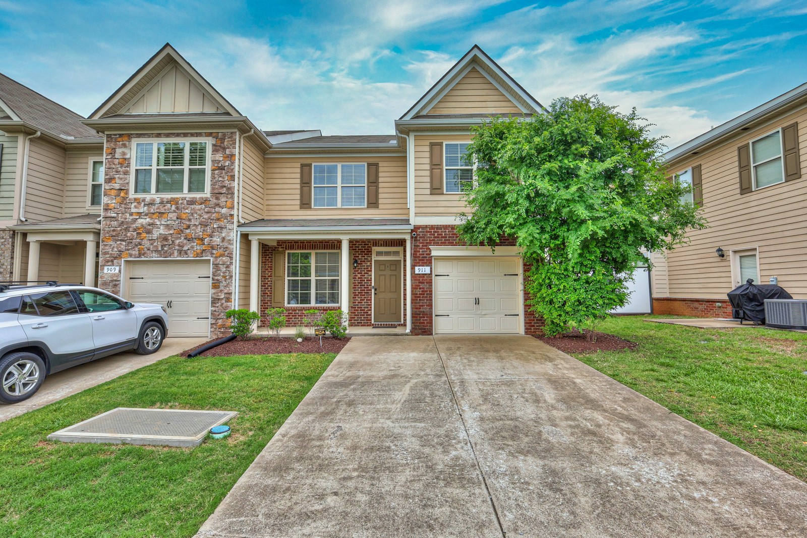 911 Brigade Loop Murfreesboro, TN 37128 - Photo 27 of 29 a front view of a house with a yard
