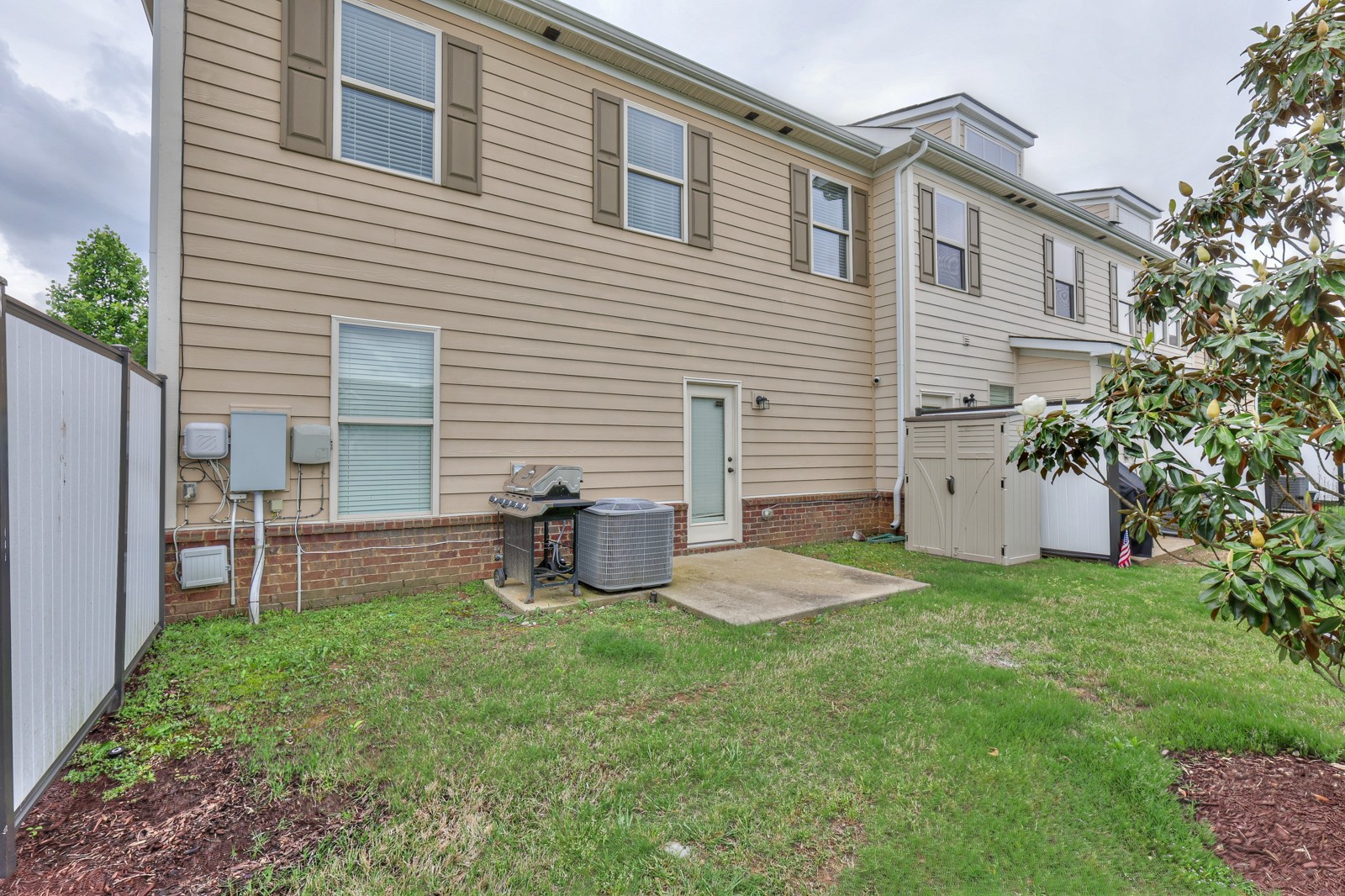 911 Brigade Loop Murfreesboro, TN 37128 - Photo 29 of 29 a view of a house with backyard and sitting area
