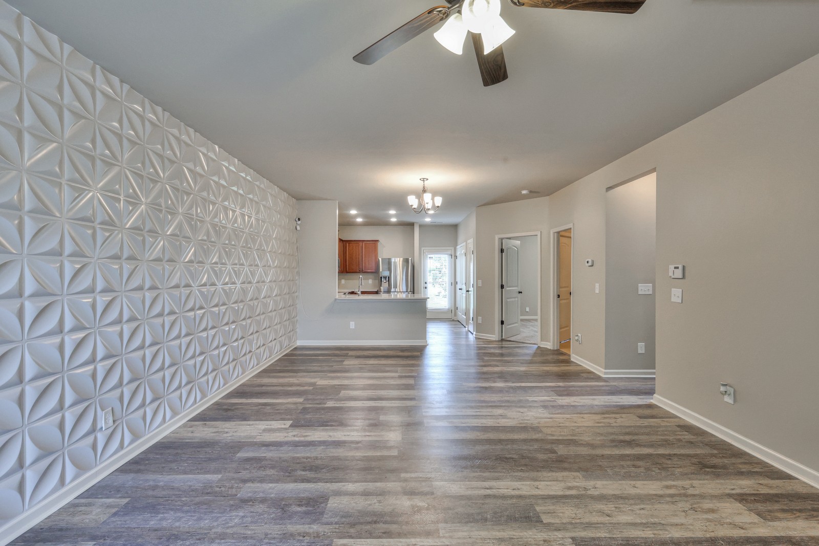 911 Brigade Loop Murfreesboro, TN 37128 - Photo 4 of 29 a view of a hallway with wooden floor