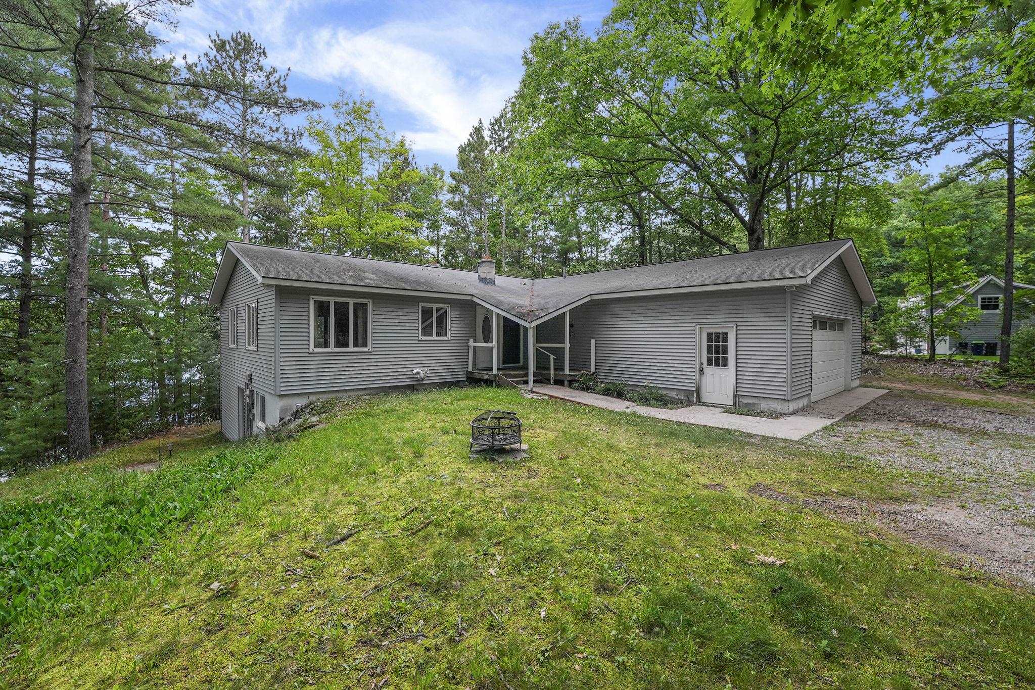 21 High Lake Road Traverse City, MI 49696 - Photo 1 of 57 1949263-a0b9e0ea-0081-409d-ae0e-5281bf0522bc.JPG