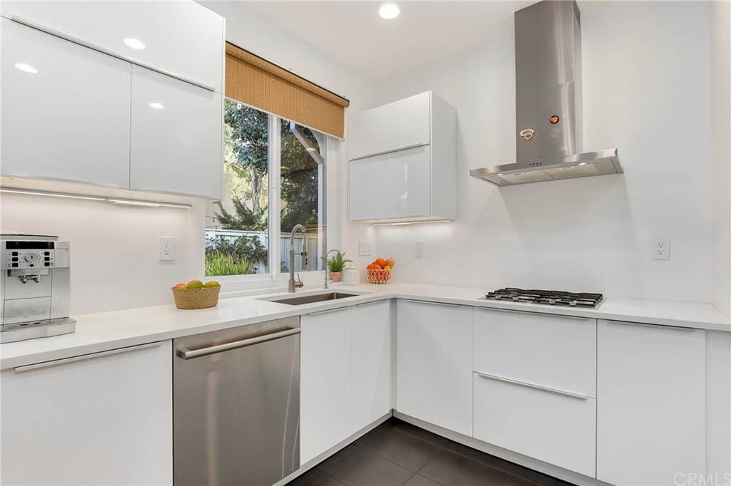 15 Marsala Irvine, CA 92606 - Photo 13 of 31 a kitchen with a sink and cabinets