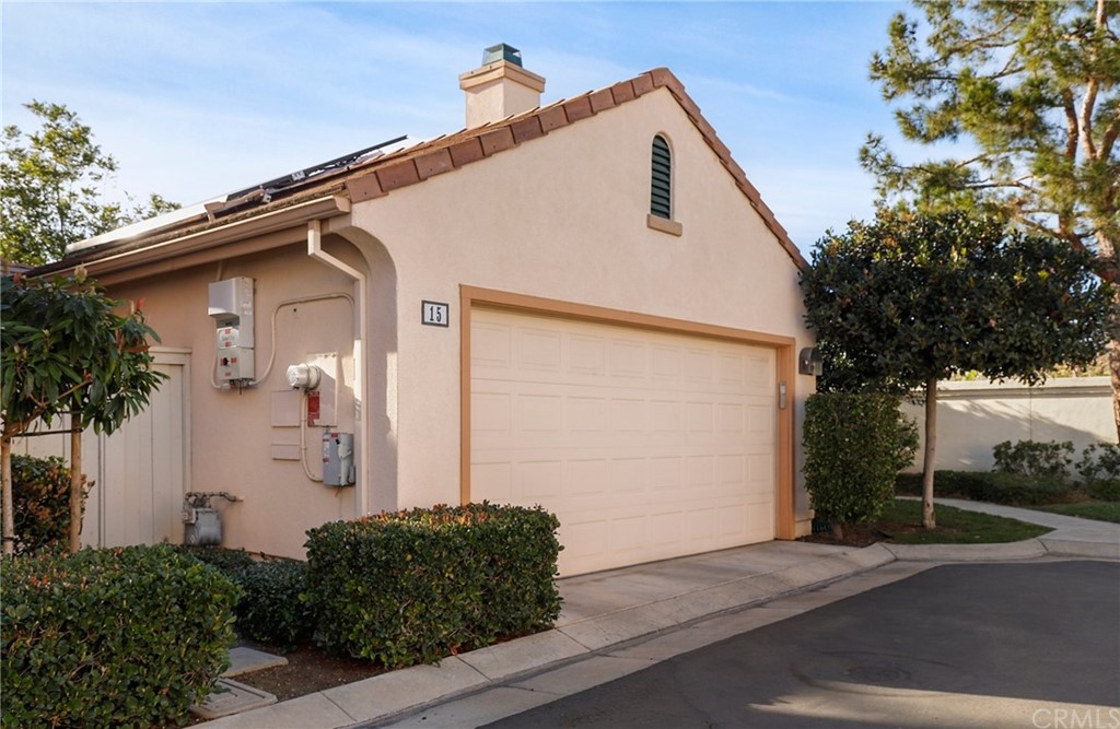15 Marsala Irvine, CA 92606 - Photo 2 of 31 a view of a blue house with a yard and plants