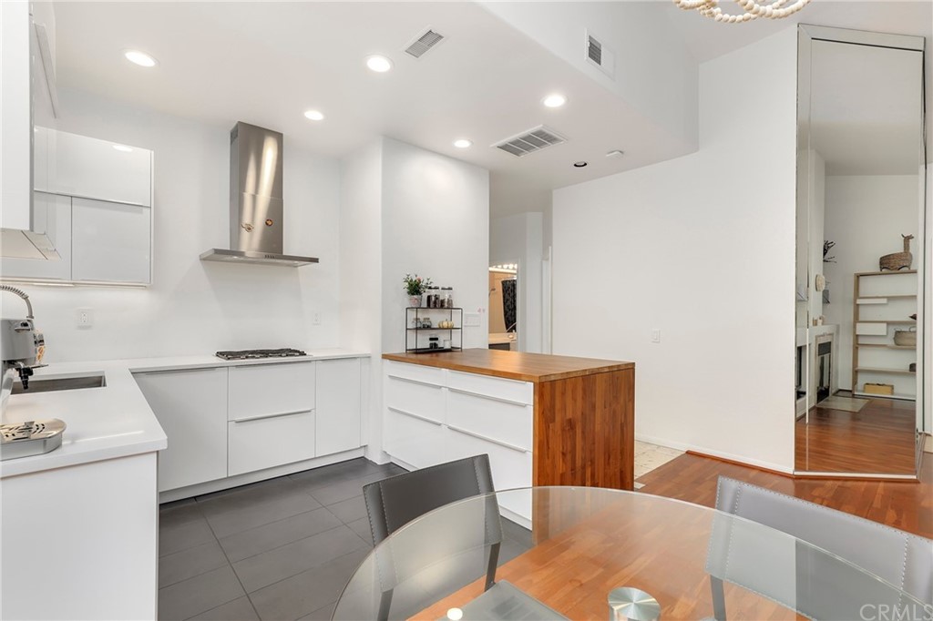15 Marsala Irvine, CA 92606 - Photo 8 of 31 a kitchen with stainless steel appliances granite countertop a sink a stove and a refrigerator