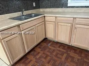 a close view of a stove and microwave