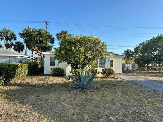 a view of a house with a patio