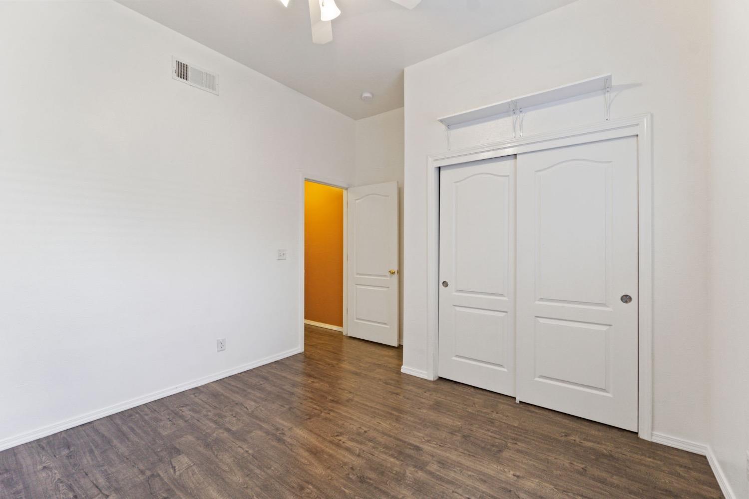 3089 Express Court Madera, CA 93637 - Photo 25 of 39 a view of an empty room with closet and a window