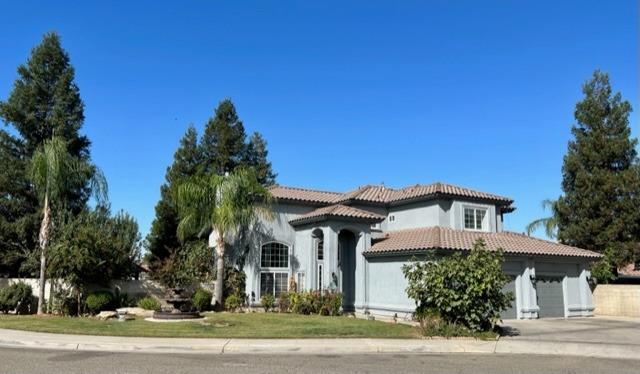 3089 Express Court Madera, CA 93637 - Photo 39 of 39 a front view of a house with a yard