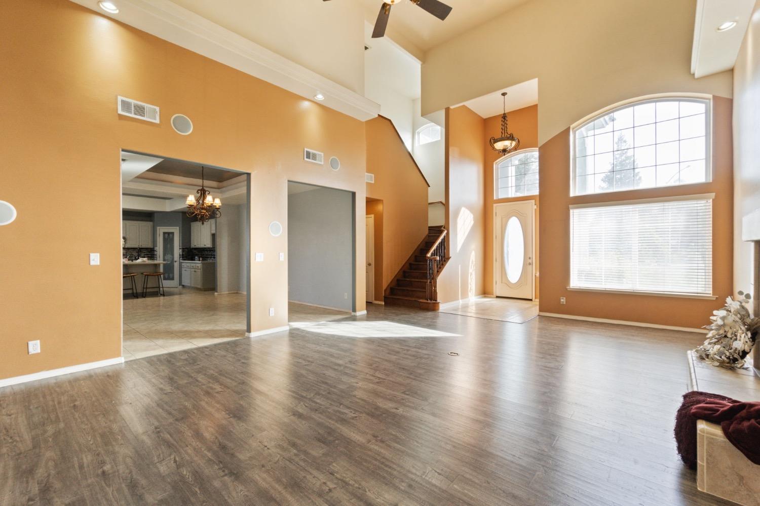 3089 Express Court Madera, CA 93637 - Photo 10 of 39 a view of an entryway with wooden floor