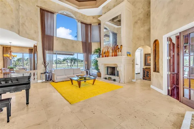 a view of a livingroom with furniture and a fireplace