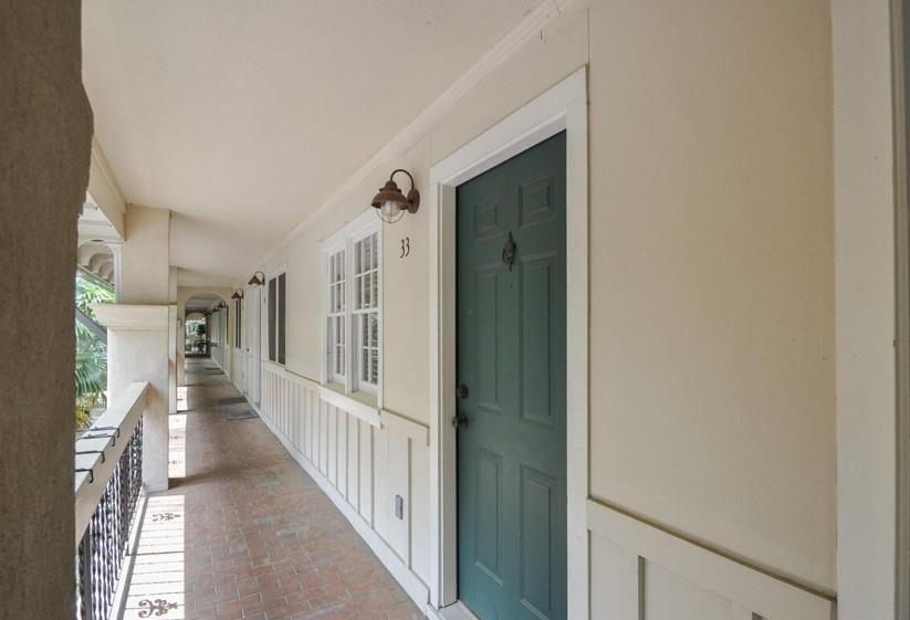 655 East Campus Road, Unit 33 Athens, GA 30605 - Photo 5 of 13 a view of a hallway with wooden floor and entryway