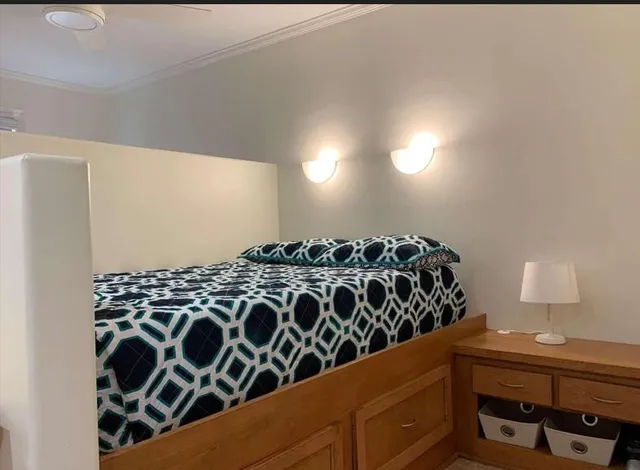 a bedroom with a bed