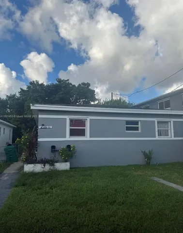 a view of a house with a garden