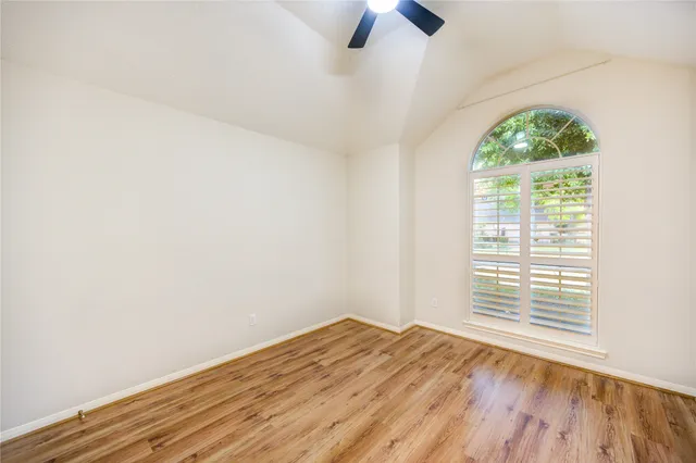 a bathroom with a sink a mirror and a shower