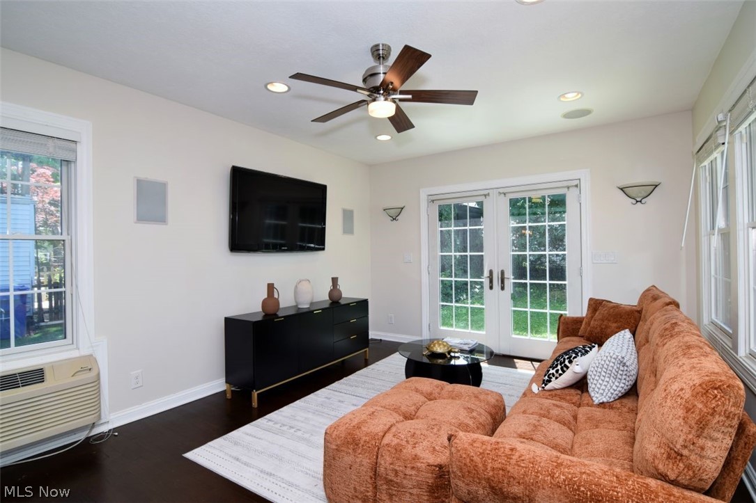 3806 Westwood Road University Heights, OH 44118 - Photo 8 of 41 Living area featuring rich wood-finish flooring, recessed ceiling lighting, a ceiling fan, and white walls
