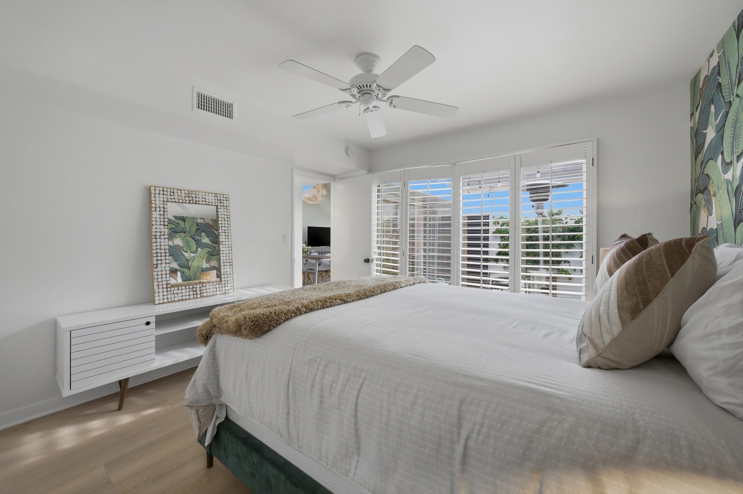 23 Leon Way Rancho Mirage, CA 92270 - Photo 15 of 32 a bed sitting in a bedroom next to a window