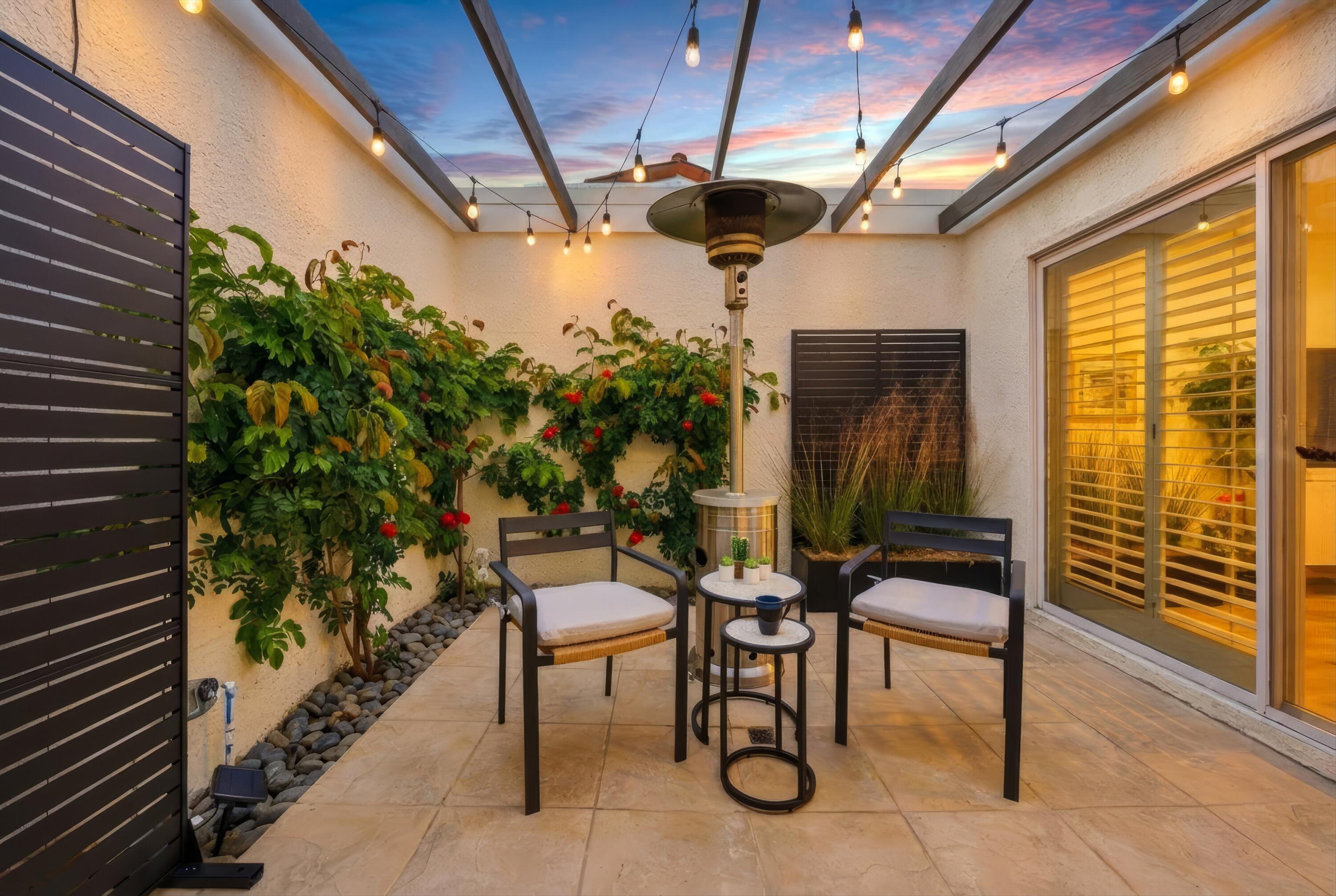 23 Leon Way Rancho Mirage, CA 92270 - Photo 28 of 32 a view of a porch with furniture and a yard
