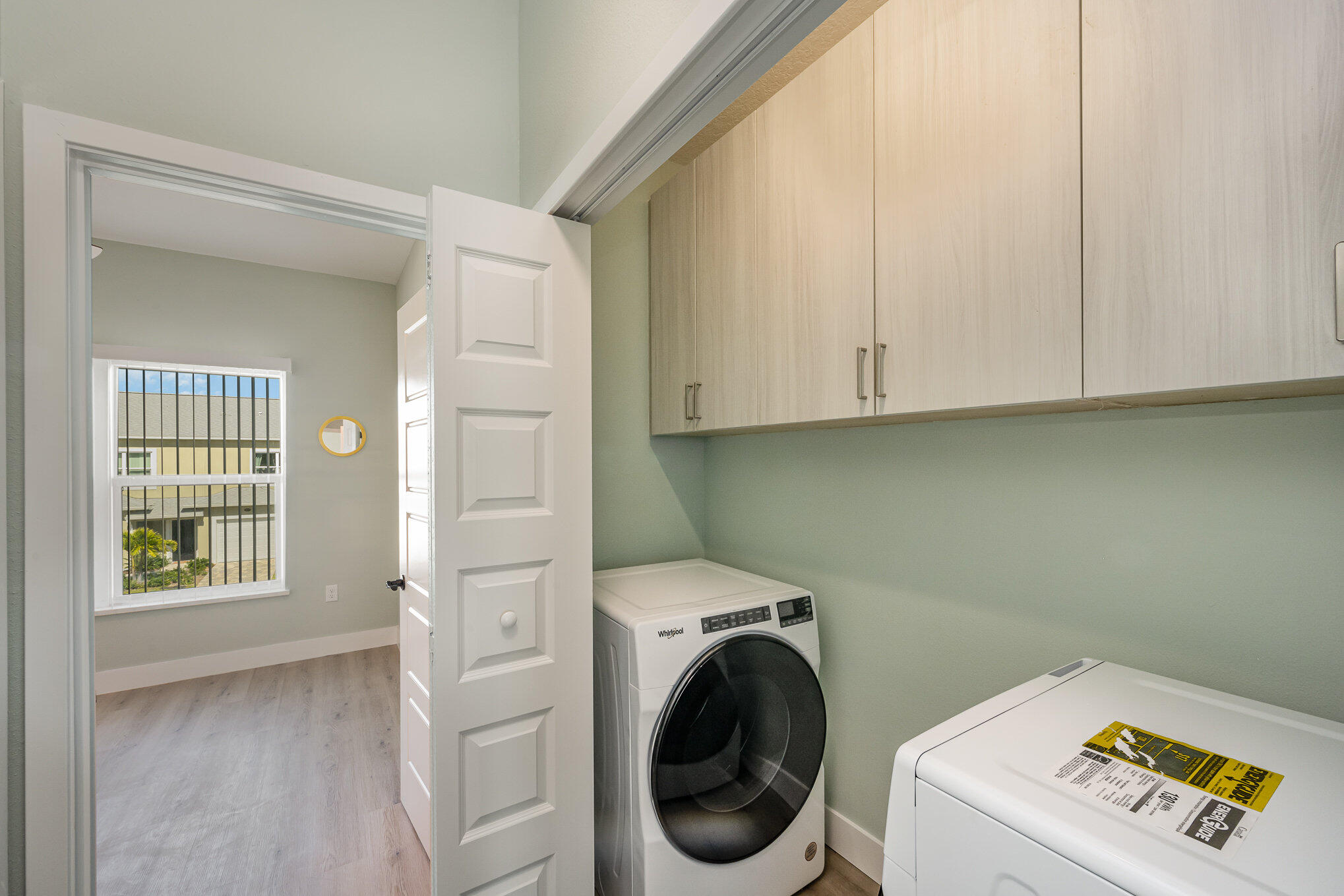 900 Paddleboard Court Melbourne, FL 32935 - Photo 20 of 32 a utility room with dryer and washer