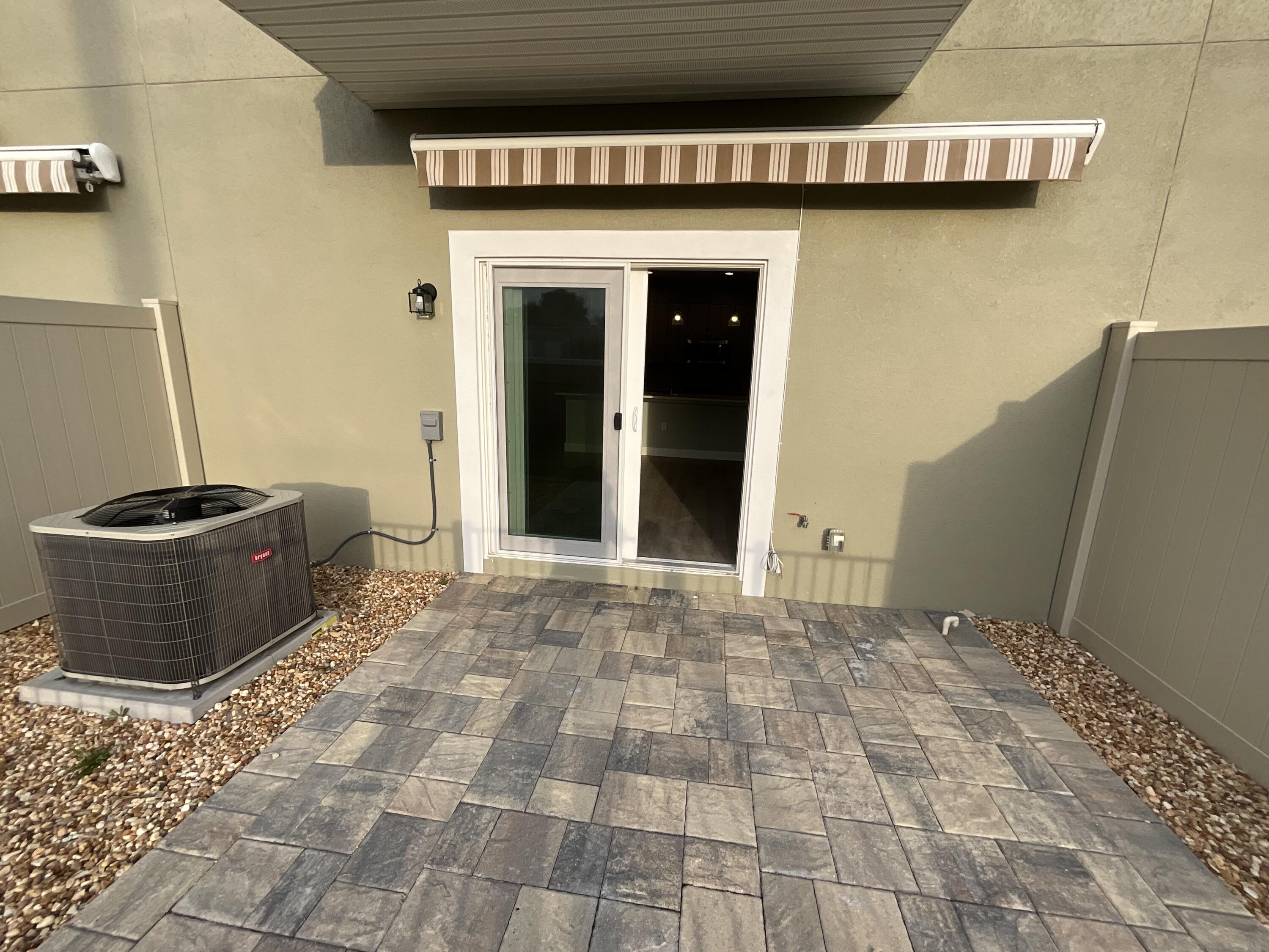 900 Paddleboard Court Melbourne, FL 32935 - Photo 30 of 32 a view of a entryway door of the house