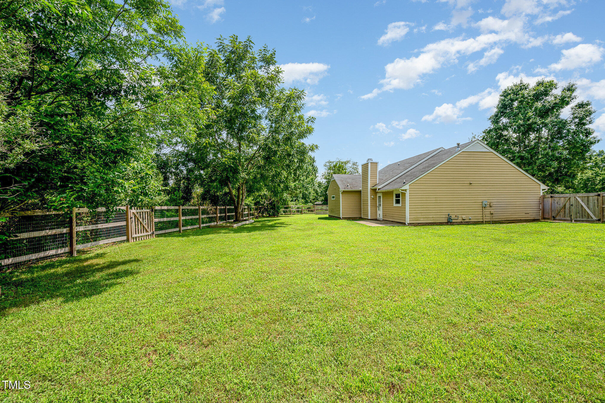 6 Blake Court Durham, NC 27712 - Photo 17 of 19 a view of a house with backyard