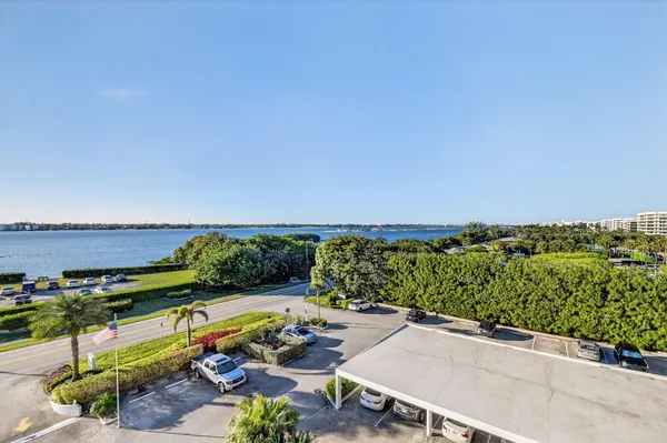 an aerial view of a house with yard swimming pool and outdoor seating