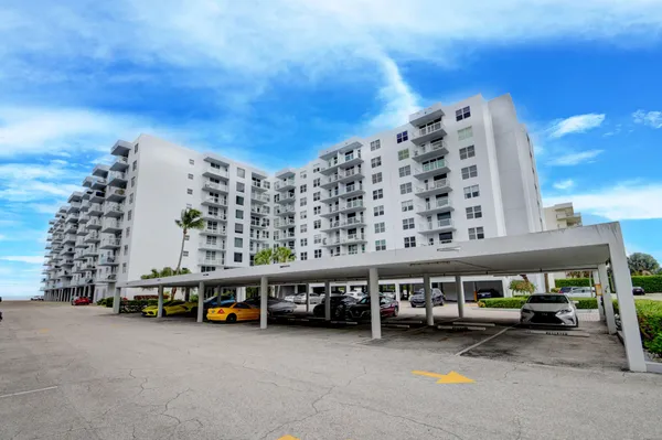 a large building with a car parked in front of it
