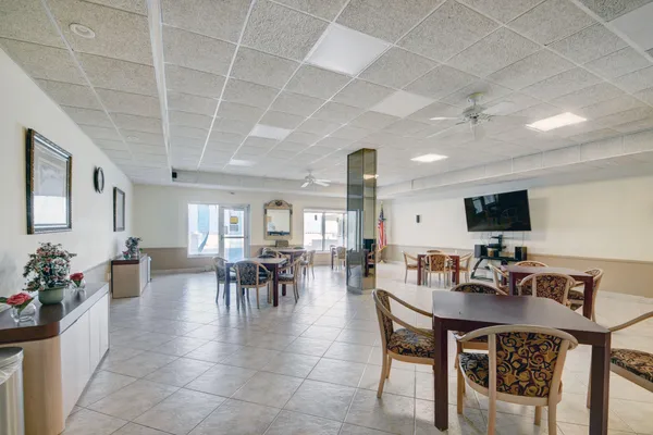 a view of a dining room with furniture