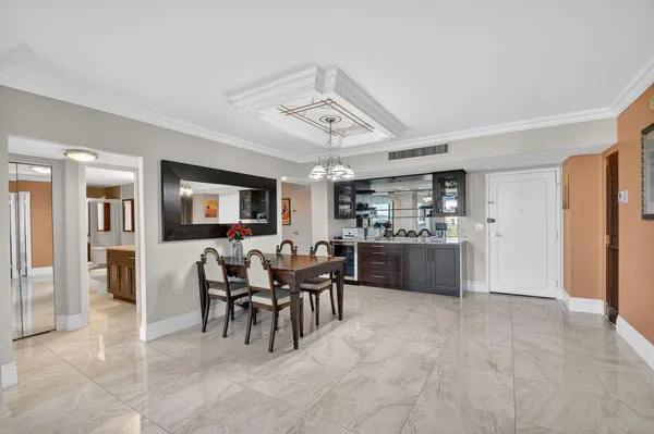 a view of a dining room kitchen and a window