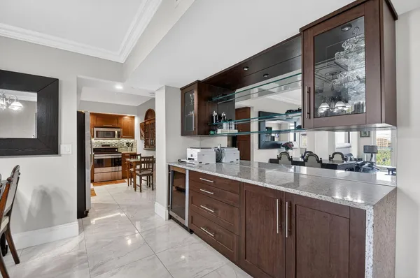 a kitchen with sink cabinets and window