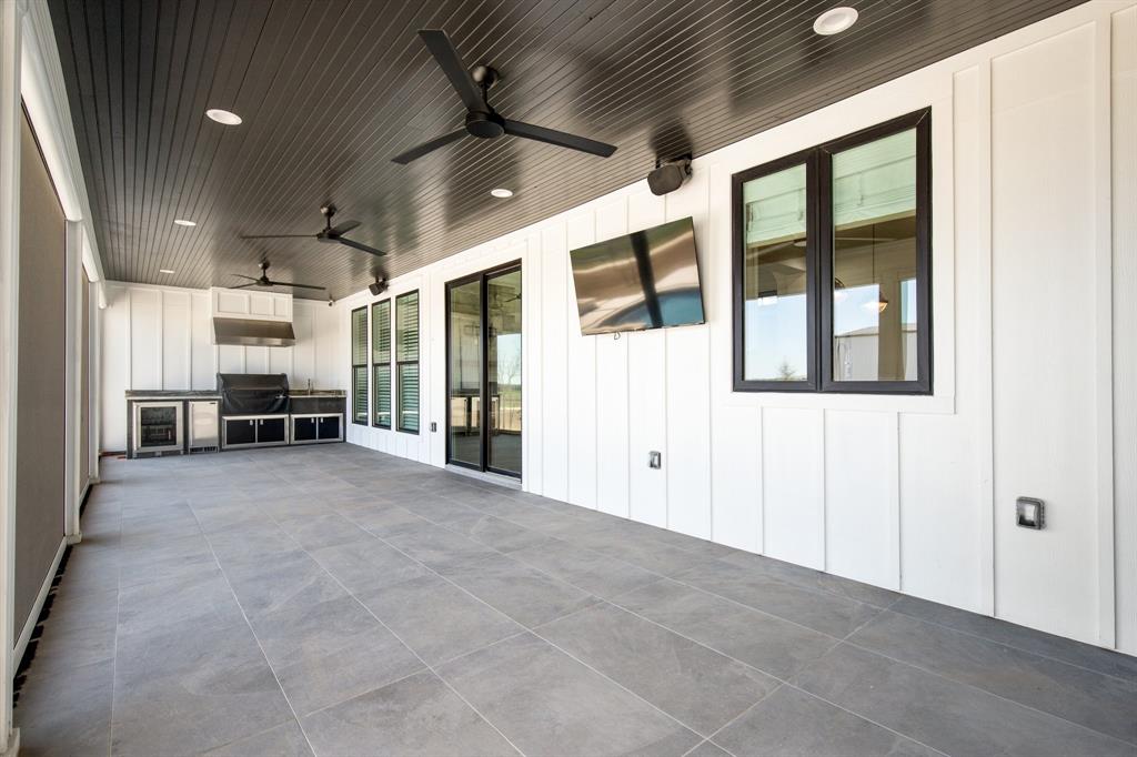 470 Forreston Road Waxahachie, TX 75165 - Photo 18 of 38 View of patio with wine cooler, area for grilling, and ceiling fan