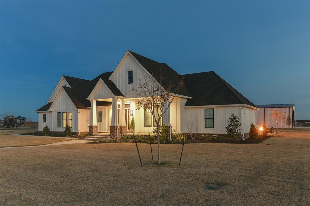 470 Forreston Road Waxahachie, TX 75165 - Photo 10 of 38 Modern farmhouse style home with board and batten siding and a front lawn
