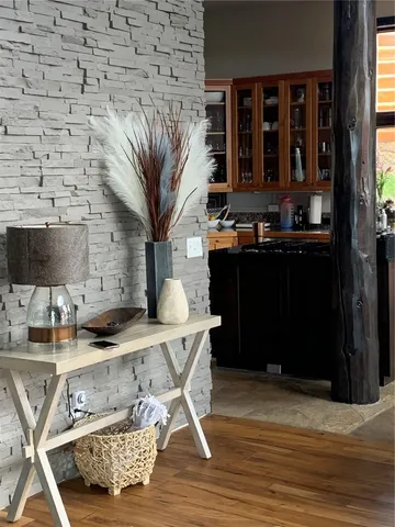 a large bed sitting in a bedroom next to a window