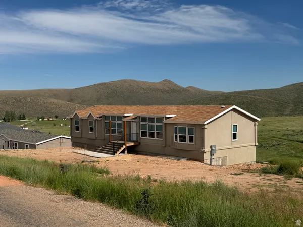 $599,900 | 98 Clubhouse Drive, Unit 1, Garden City, UT 84028