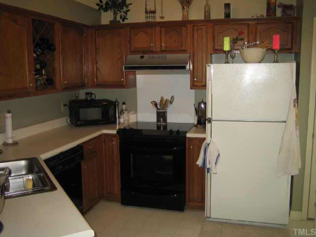 3609 Hopper Street Raleigh, NC 27616 - Photo 4 of 10 Wow! Spacious kitchen with nearly new convection oven featuring a smooth surface cook top!