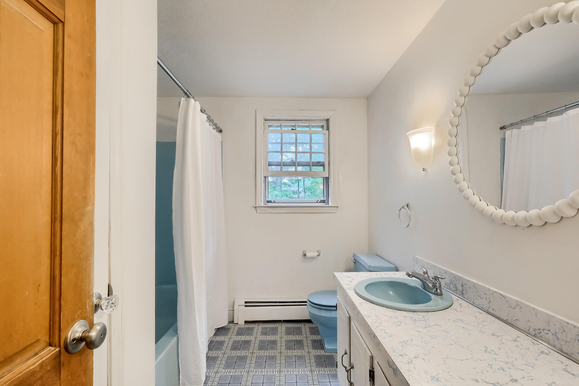 18 Crowell Road Sandwich, MA 02563 - Photo 19 of 31 a bathroom with a sink and a mirror