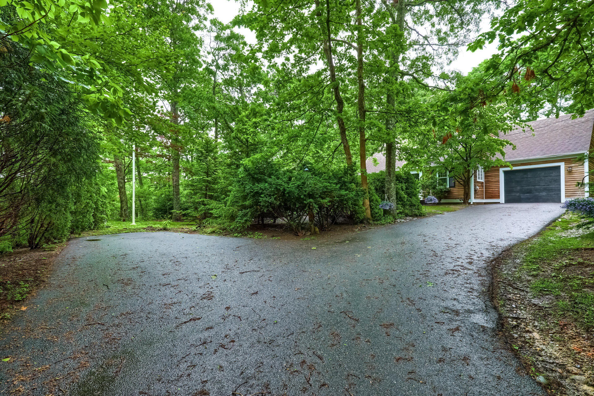 18 Crowell Road Sandwich, MA 02563 - Photo 2 of 31 a view of a house with large trees