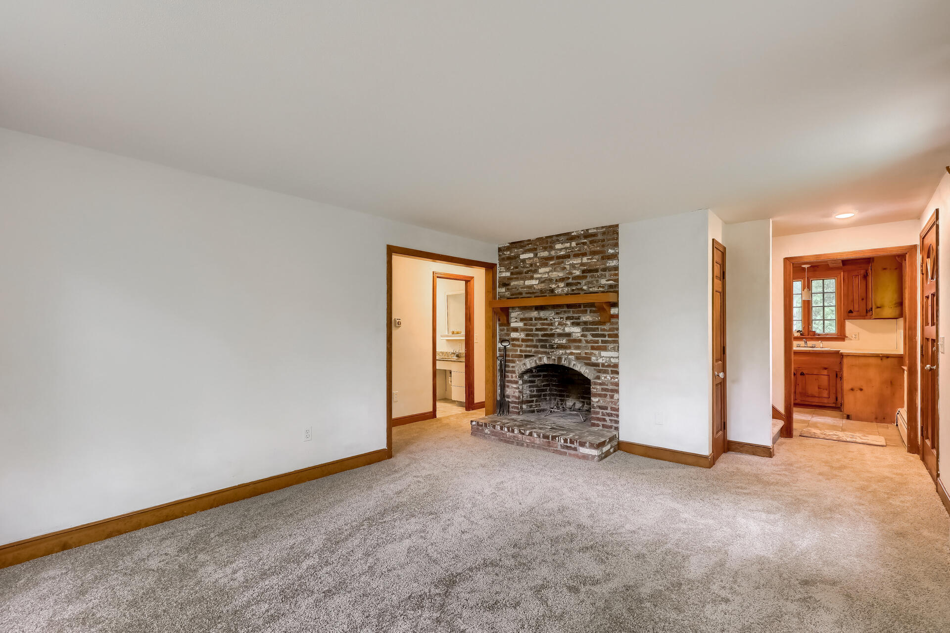18 Crowell Road Sandwich, MA 02563 - Photo 5 of 31 a view of empty room with a fireplace